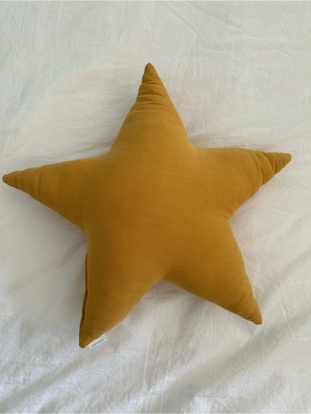 H&M Star-Shaped Throw Pillow in Mustard
